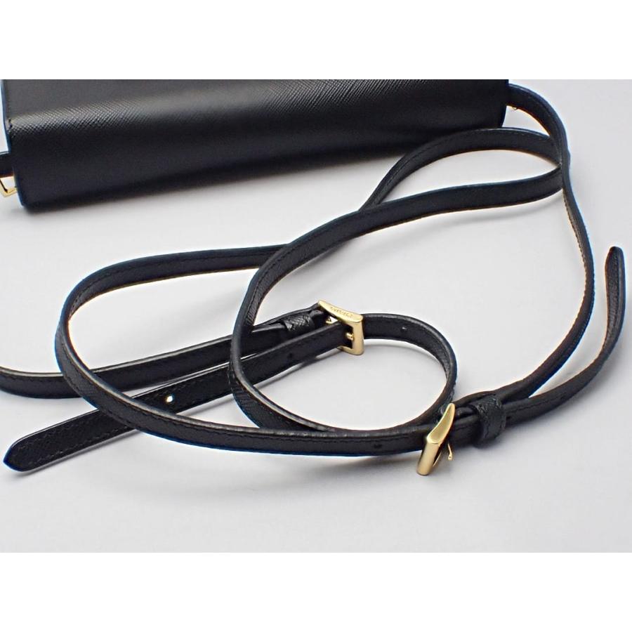 PRADA プラダ ショルダーウォレット BT1009 サフィアーノラクス ブラック 中古B+ 【送料無料】 A-8754【質屋出品】 楽天市場】PRADA プラダ ショルダーウォレット BT1009 サフィアーノ