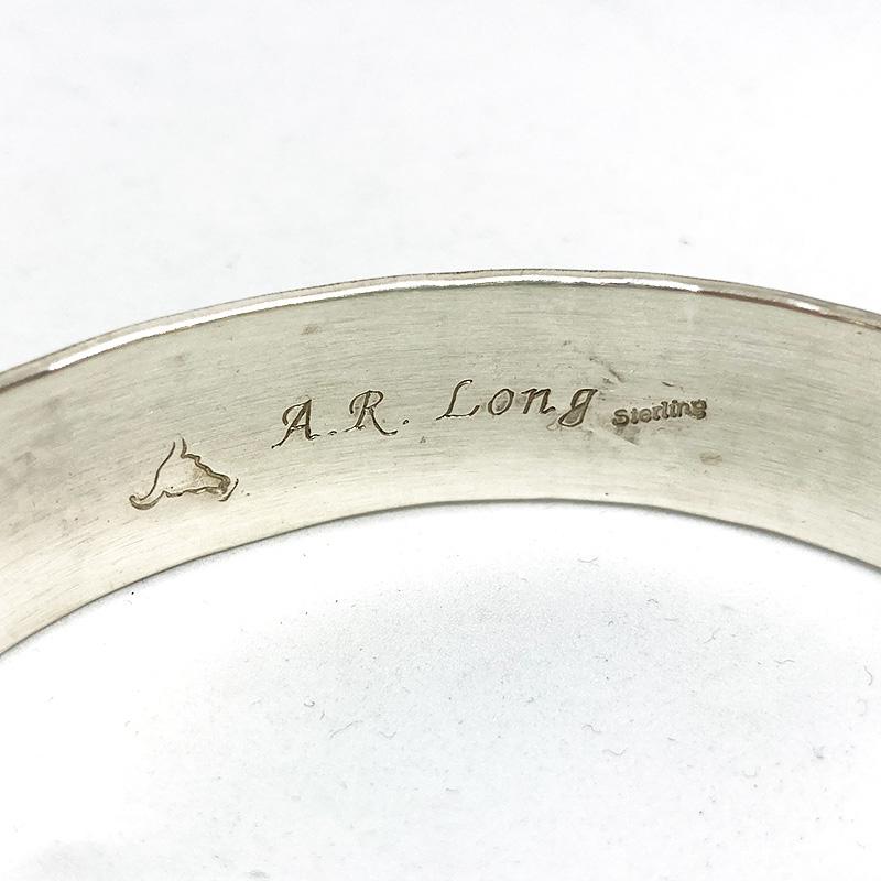 エイドリアンリーブスロング 作4面スタンプトライアングルバングル