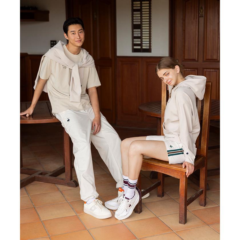 Le coq sportif 　透湿防水機能 裏メッシュ、肘と膝ジッパーで七分に Le coq sportif 透湿防水機能 裏メッシュ、肘と膝ジッパーで七分に