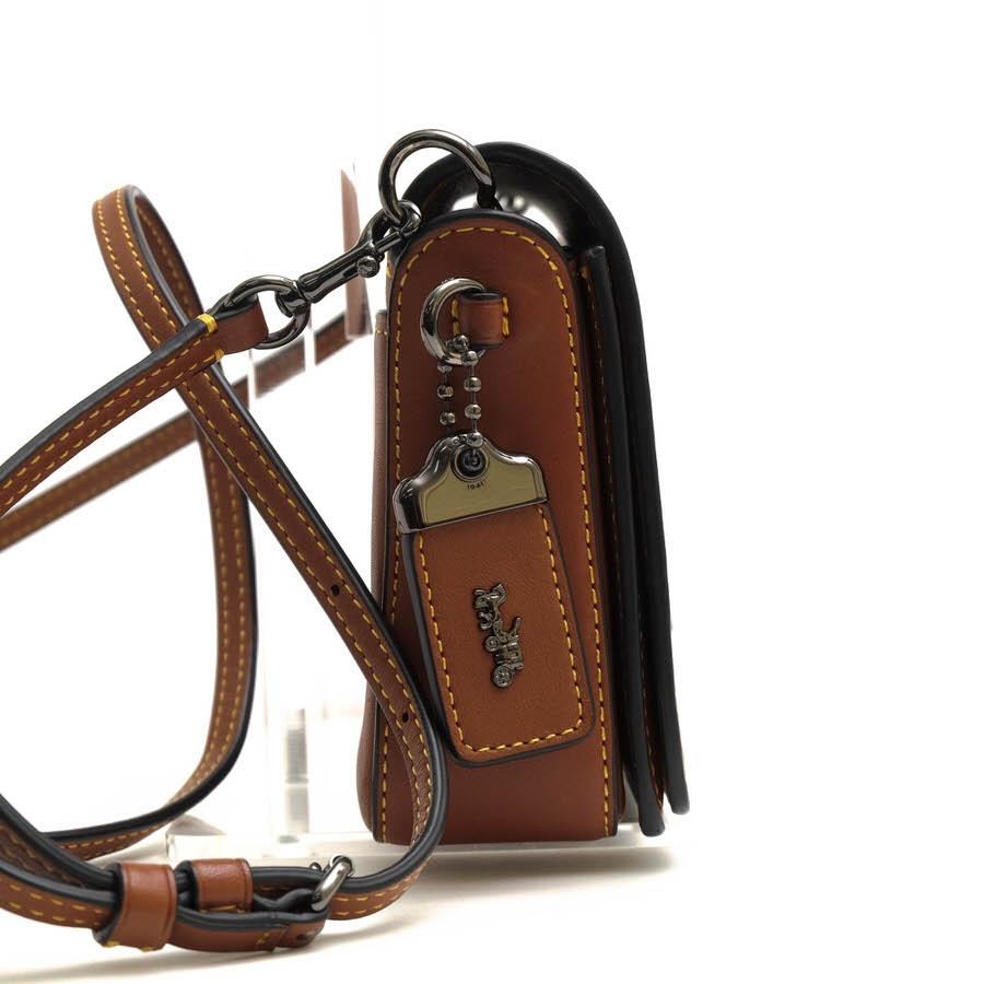 新品　コーチ×ディズニー ショルダーバッグ レザー ×キャンバス シグネチャー 公式】COACH – コーチ | 【DISNEY X COACH】スウィンガー 20