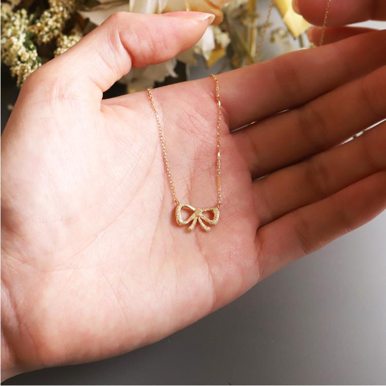 k18 ゴールド　オニキスリボンペンダント　ネックレス　【美品】　最終価格 VALUABLE