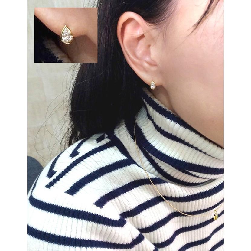 0.3カラット ペアシェイプ ダイヤ一粒ピアス スタッズYGで囲み Dカラー