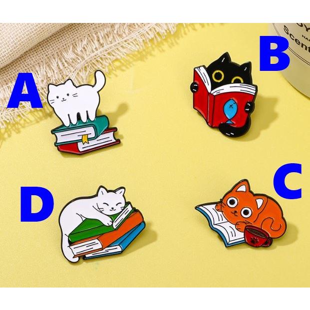 可愛い猫のピンバッジ 本を読む猫 本に抱きつく猫 本の上に乗る猫