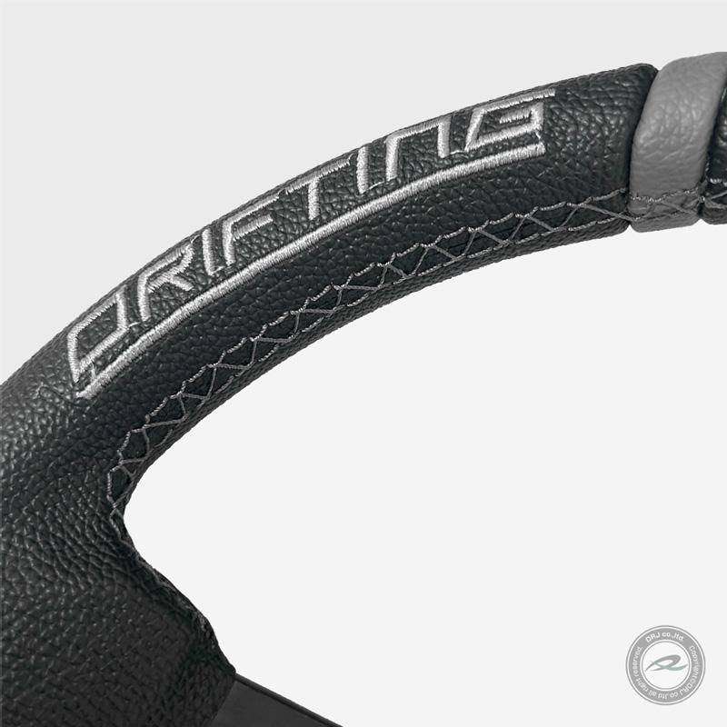 ステアリング 32φ ディープコーン 70mm グレイDRIFTING＆ クロスステッチ フェイクレザーPVC DD32PG |  | 02