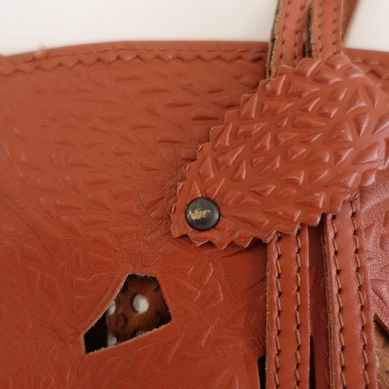 ジャマン ピュエッシュ緑色ハンドバッグ 赤いジッパー付き