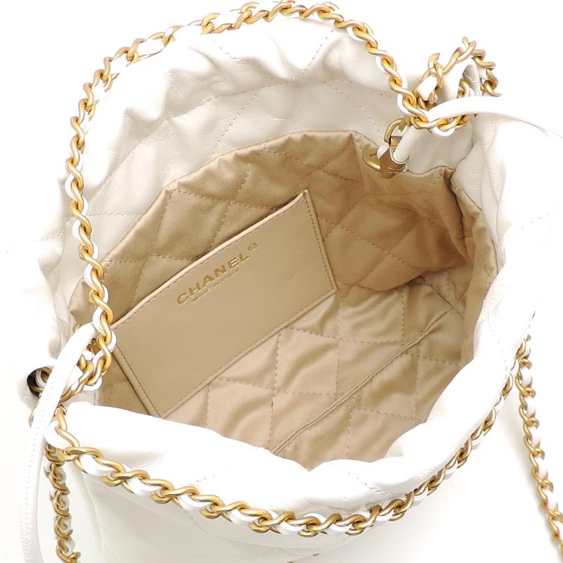 激レア❤CHANEL❤ホワイトラメ巾着ショルダーバッグゴールドチェーン シャネル チェーンウォレット ホワイト キャビアスキン シャンパン