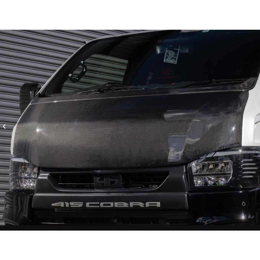 415コブラ　バッドフェイスボンネットBy2 カーボン （綾織） 415 コブラ ハイエース 200系 ワイド 1〜6型 バッドフェイスボンネット