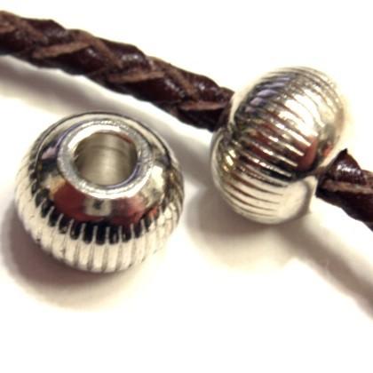 [CH015]メタルビーズ　No.232 シルバー　約10×7mm　3mm穴 2ケ[RPT] | 