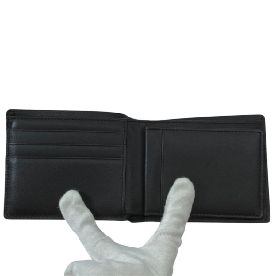 MCM（エムシーエム） 美品 二つ折り財布 型押しレザー ロゴ MXS3AND01