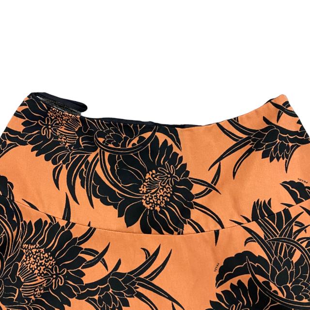 PRADA プラダ ラップ スカート ボトムス アパレル ひざ丈 総柄 ダリア  