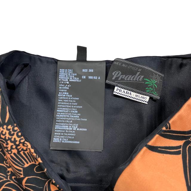 PRADA プラダ ラップ スカート ボトムス アパレル ひざ丈 総柄 ダリア  