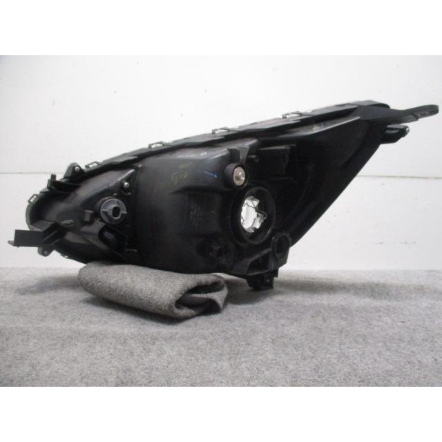 ミラージュ A03A/A05A 右ヘッドライト/ランプ ハロゲン STANLEY W0504