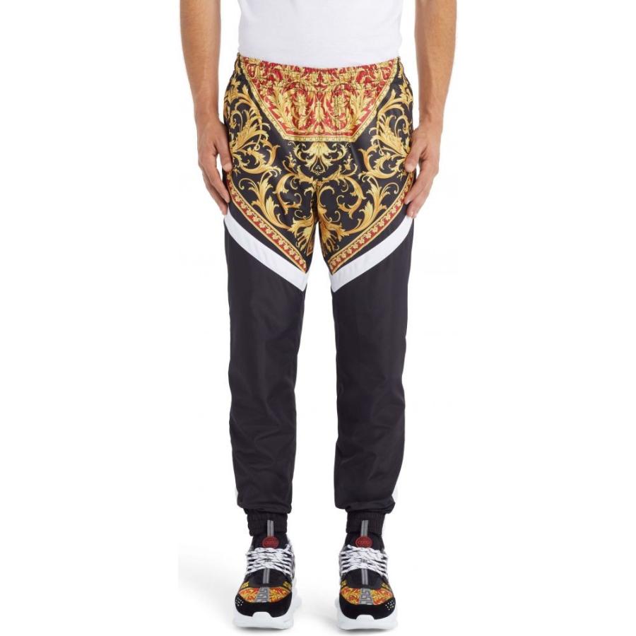 red and yellow track pants