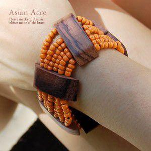 アジアン雑貨 木製プレートとビーズのアシンメトリーブレスレット オレンジ アジア工房 10098 | ブランド登録なし