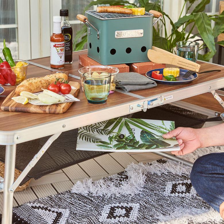 折りたたみ テーブル アウトドア フォールディング 木目 幅129cm 補助 ネット付 ポータブル 持ち運び 簡易 携帯 キャンプ バーベキュー レジャー おしゃれ 91563 | 東谷 | 05