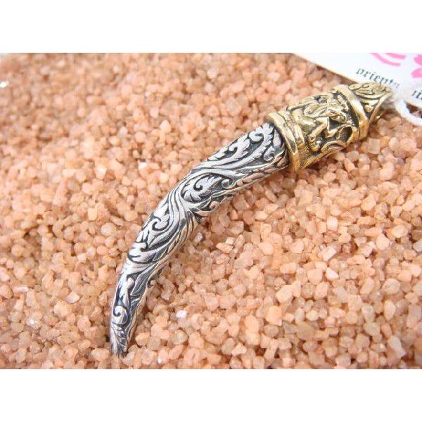 送料無料 オリエンタルバイブレーション ペンダントトップ 牙モチーフ シルバー925 人気ブランド |  | 02