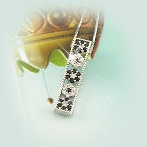 ブラックダイヤモンド ネックレス ゴールド 18k ペンダント フラワー 花 ミル 18金 誕生日 プレゼント 父の日の画像