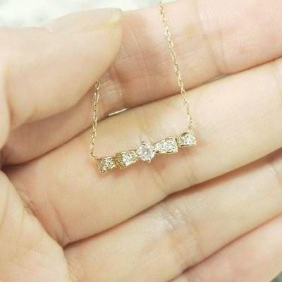 ネックレス レディース リボン ペンダント 天然ダイヤモンド 0.20ct k18ゴールド 誕生日 プレゼント ギフト 父の日の画像