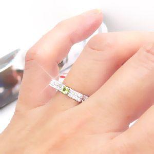 指輪 ペリドット 8月誕生石 ダイヤモンド 0.3ct リング リボン プラチナ900 pt900 レディース ジュエリー アクセサリーの画像