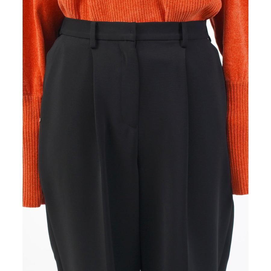 シニヨン チャーム付テーパードパンツ CHIGNON レディース 国内正規品