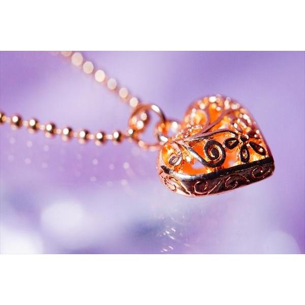 18kリバーシブルハート型透かしデザインチャーム