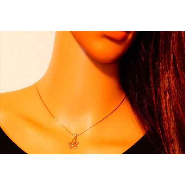 ハワイアンジュエリー ホヌ(海がめ)モチーフ 透かし柄斜め向きデザイン