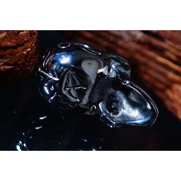 トライバルタトゥーヘッド ブラックロジウムスカルシルバーペンダント