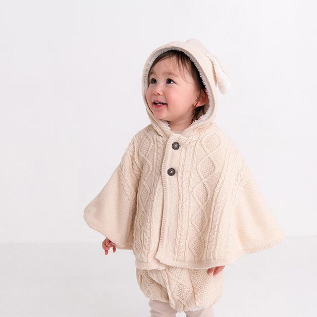 Nouer des liens ケーブルニットポンチョ A80872(アウター