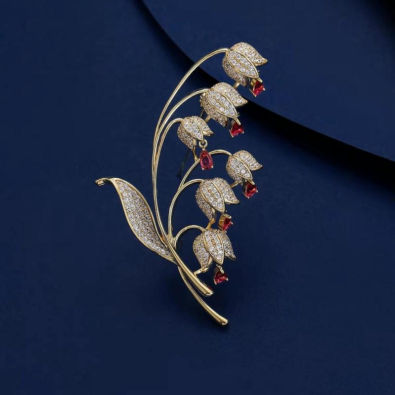 ブローチ ストールピン キラキラ揺れるスズランブローチ グリーン 緑