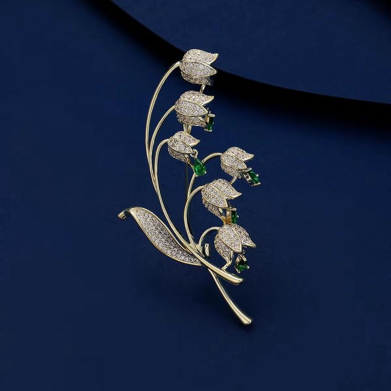 ブローチ ストールピン キラキラ揺れるスズランブローチ グリーン 緑