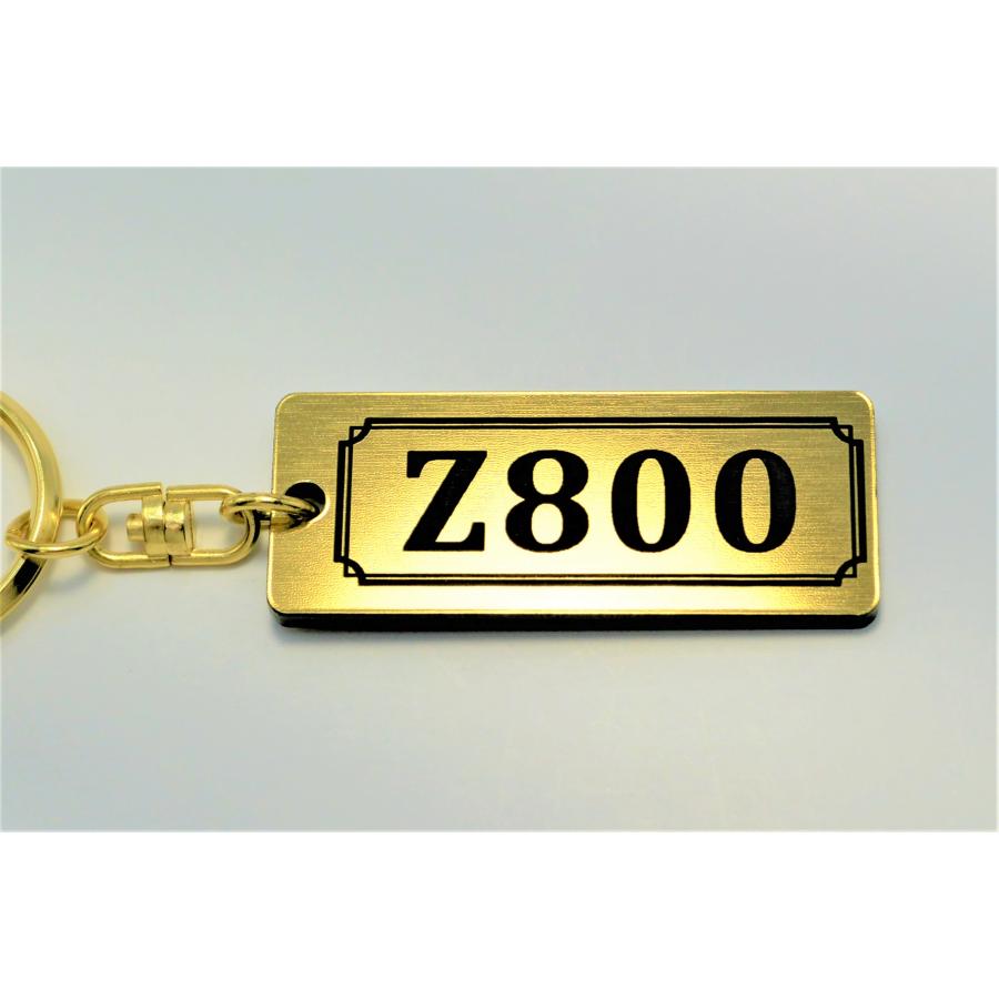 A-766-1 Z800 2層アクリル製 金黒 2重リング キーホルダー マフラー