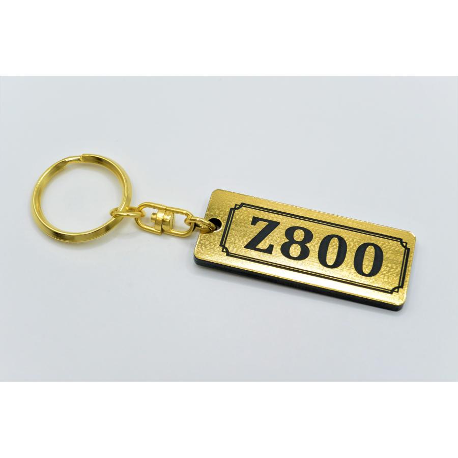 A-766-1 Z800 2層アクリル製 金黒 2重リング キーホルダー マフラー