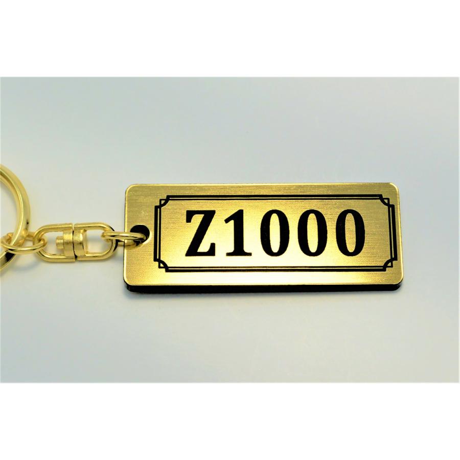 A-768-1 Z1000 2層アクリル製 金黒 2重リング キーホルダー マフラー