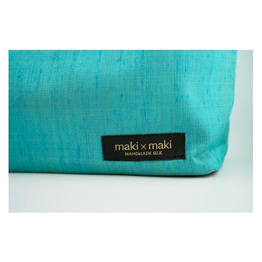 ふるさと納税 織物・繊維品 東京都 新宿区  makixmaki 高級ゴールデンシルクハンドバッグ（フェアトレード） ターコイズブルー 雑貨 フェアトレード 手織り シ…の画像