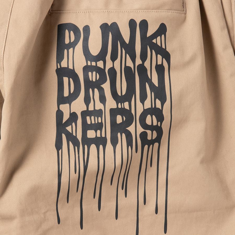 PUNK DRUNKERS（パンクドランカーズ） プリントいっぱいチノパン