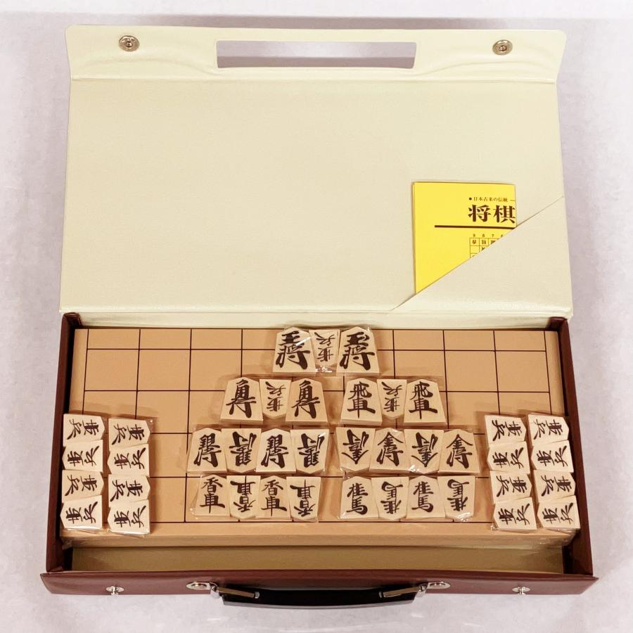 将棋セット　おまけ(入門書)付き 新品】（携帯ケース・入門書付）新桂4号折将棋盤と優良押し駒 のセット