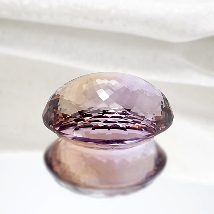 【一点物】 アメトリン ルース 127.8ct オーバルカット ブラジル産 アメジスト シトリン バイカラー 誕生石 希少石 天然石 パワーストーンの画像