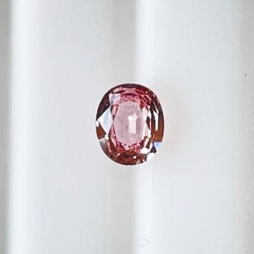 パパラチアサファイア　0.568ct　DGL 鑑別書付き　ルースの画像