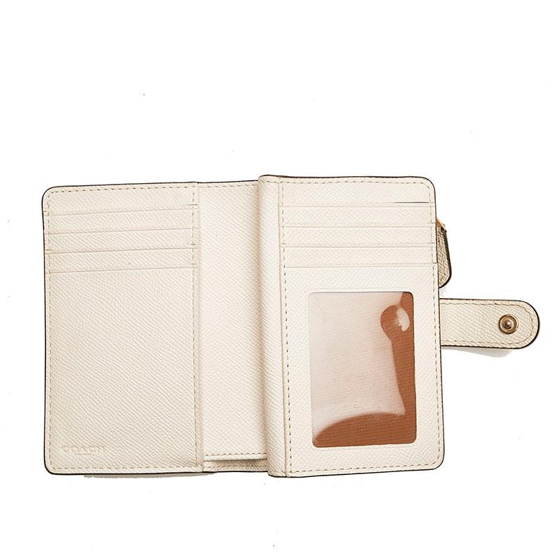 新品未使用品❤️ COACH 二つ折り財布 ホワイト フラワーパターン COACH（コーチ） スタッズ フラワー 二つ折り財布 ホワイト レザー