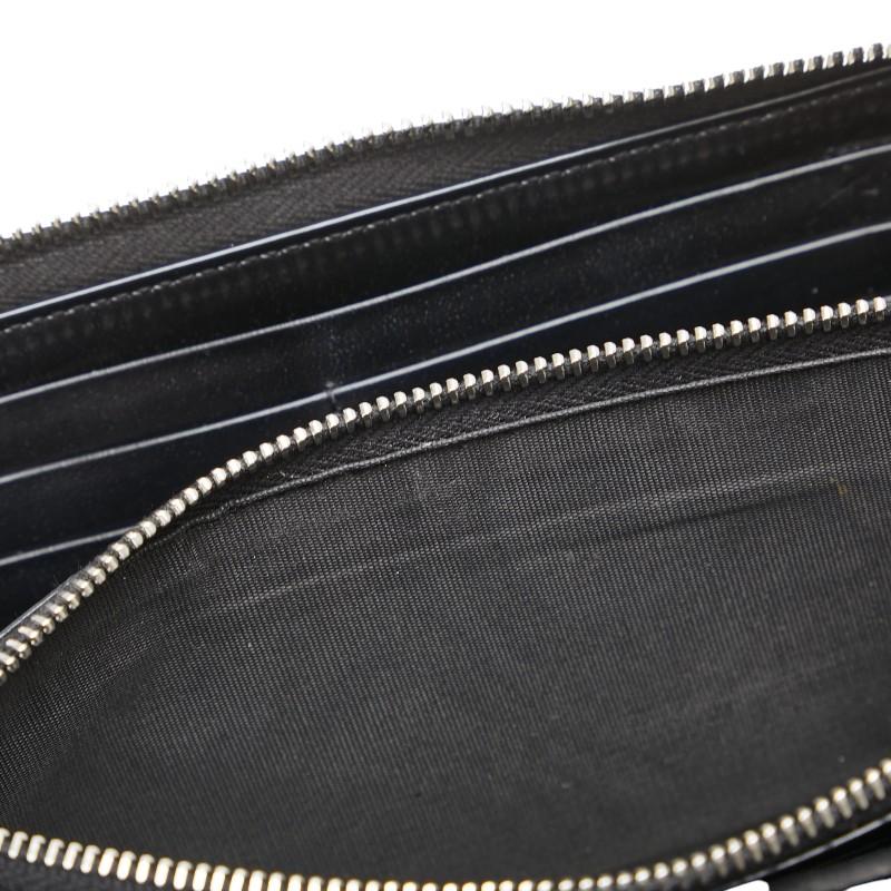 【新品同様】サンローラン ケース ラウンドジップ キャビアスキン ブラック サンローラン長財布ブイステッチキャビアスキンブラックカサンドラ