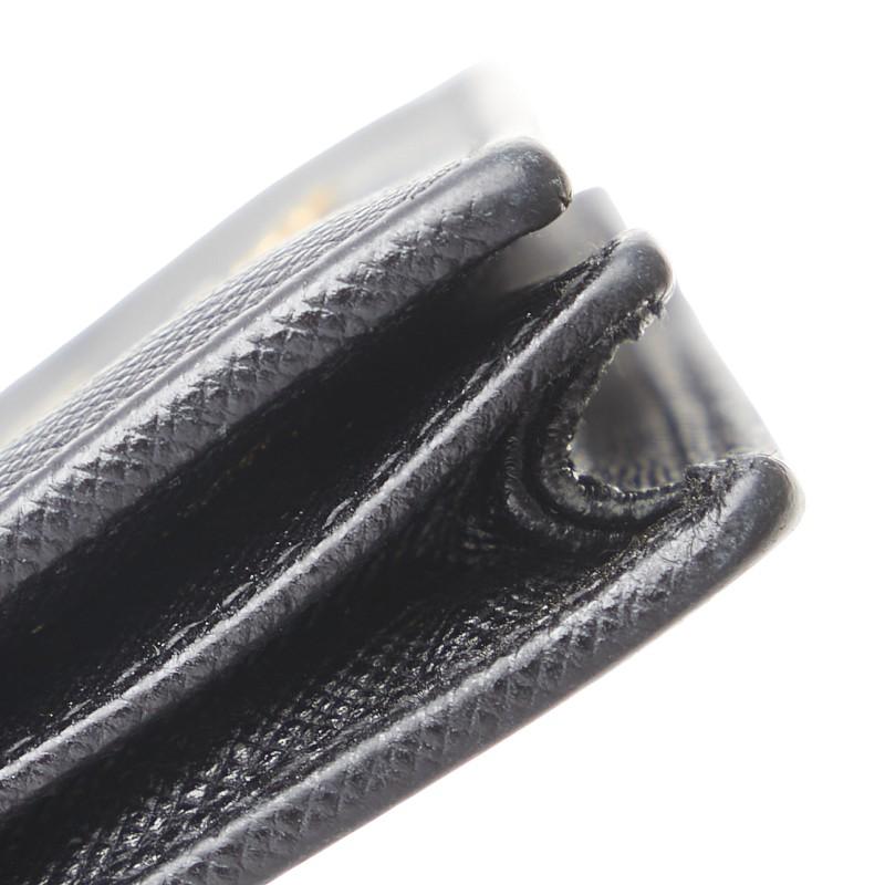 PRADA プラダ 二つ折り財布 ブラック サフィアーノレザー