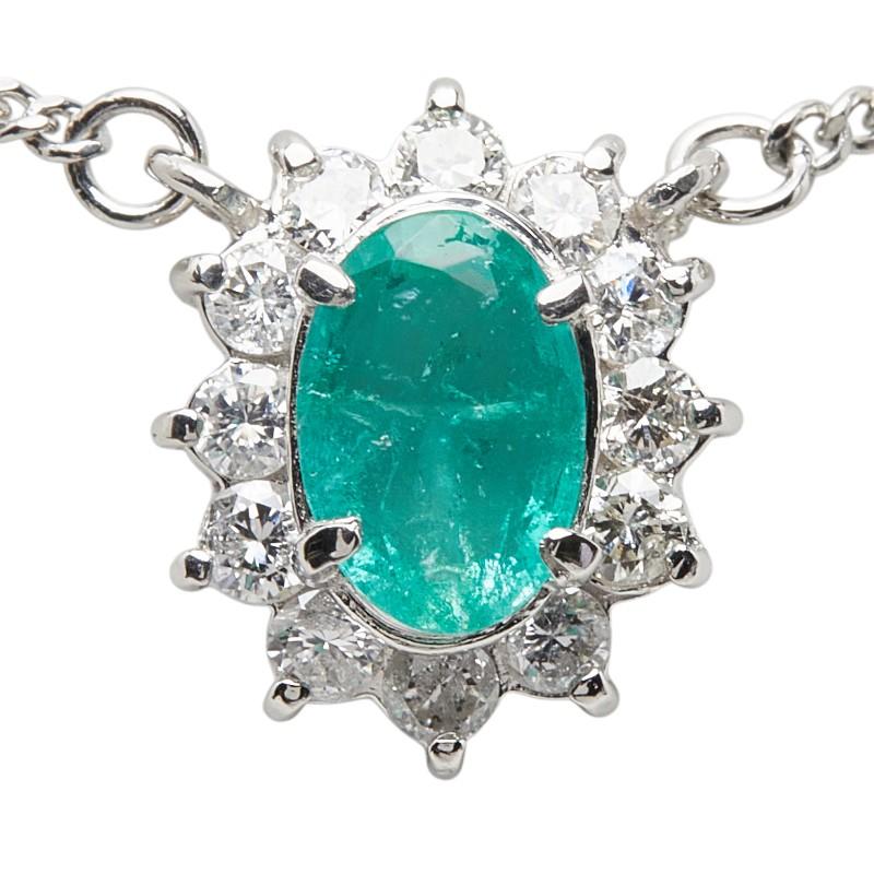 Pt850 プラチナ エメラルド0.56ct ダイヤ0.23ct フラワーモチーフ