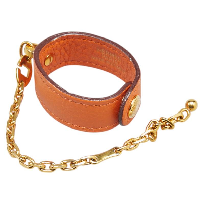 エルメス グローブホルダー オレンジ レザー レディース HERMES 【中古】 HERMES（エルメス） グローブホルダー オレンジ レザー レディース