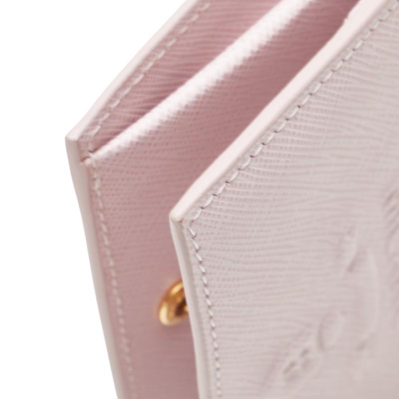 PRADA（プラダ） エンボスロゴ 二つ折り財布 ピンク サフィアーノ