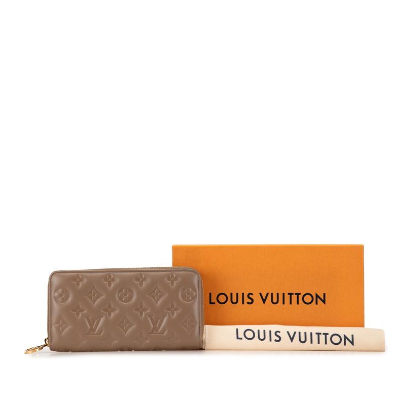 LOUIS VUITTON ルイ ヴィトン モノグラム エンボス ジッピー  