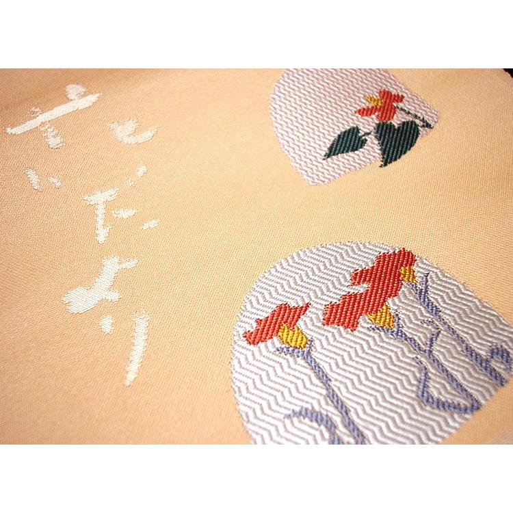 正絹 名古屋帯、ピンクがかった肌色に花模様「花ふぶき」などの言葉