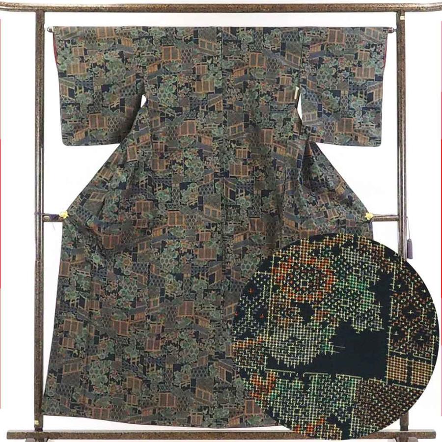 リサイクル着物 紬 正絹黒地先染袷紬着物