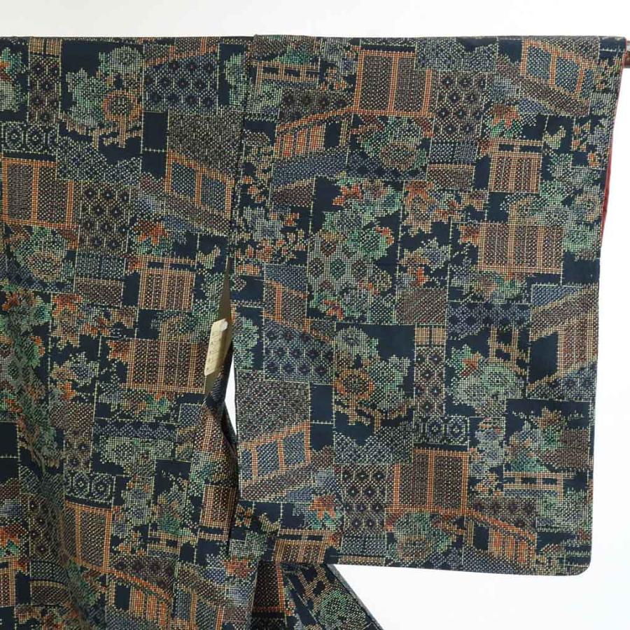 リサイクル着物 紬 正絹黒地先染袷紬着物