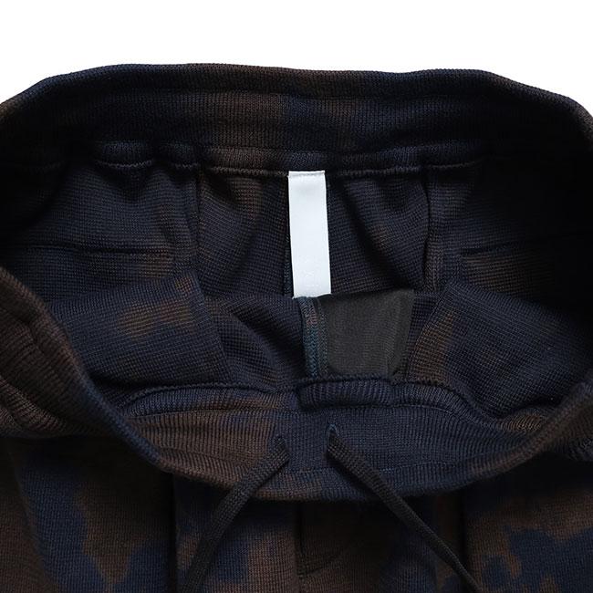 CFCL シーエフシーエル DYEING MILAN TUCKED PANTS ミラノリブ ムラ染め タックドパンツ CF011KF196 ニットパンツ タイダイ メンズの画像