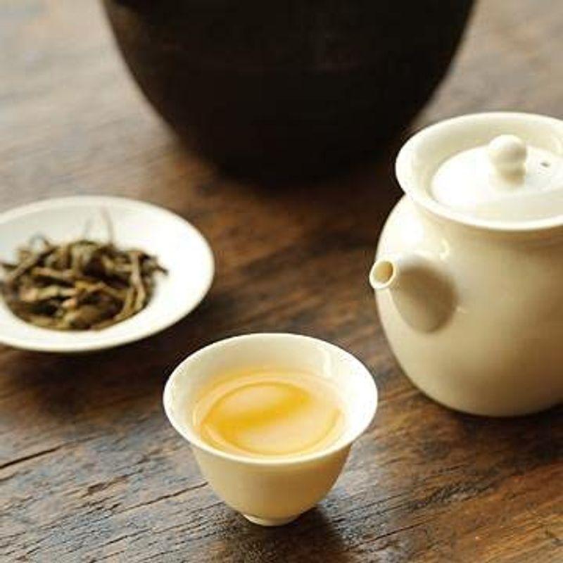 匿名配送 王徳傳ワンダーチュアン プーアール（生茶）緊壓茶357g 【F2453299125】(12333円)